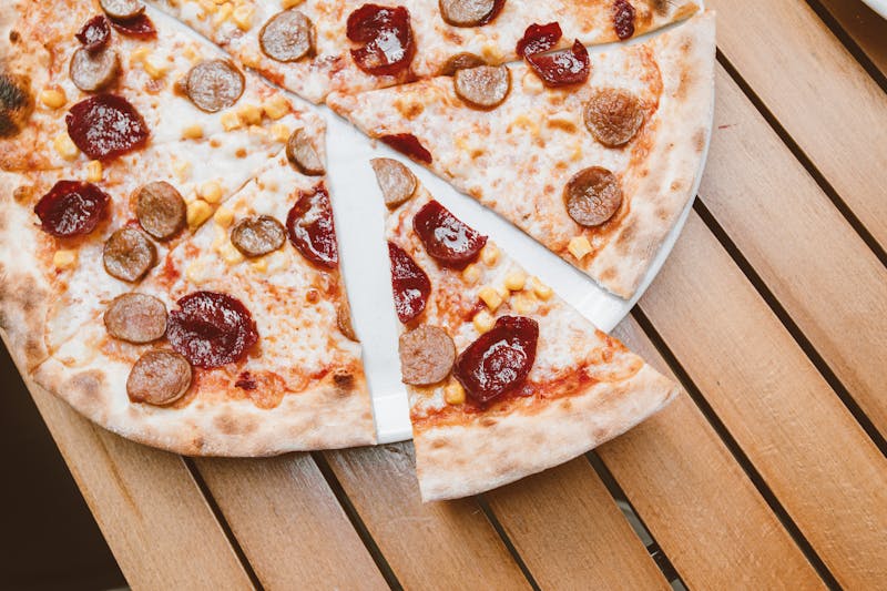 Meat Lovers marcos pizza with sausage, bacon, and pepperoni